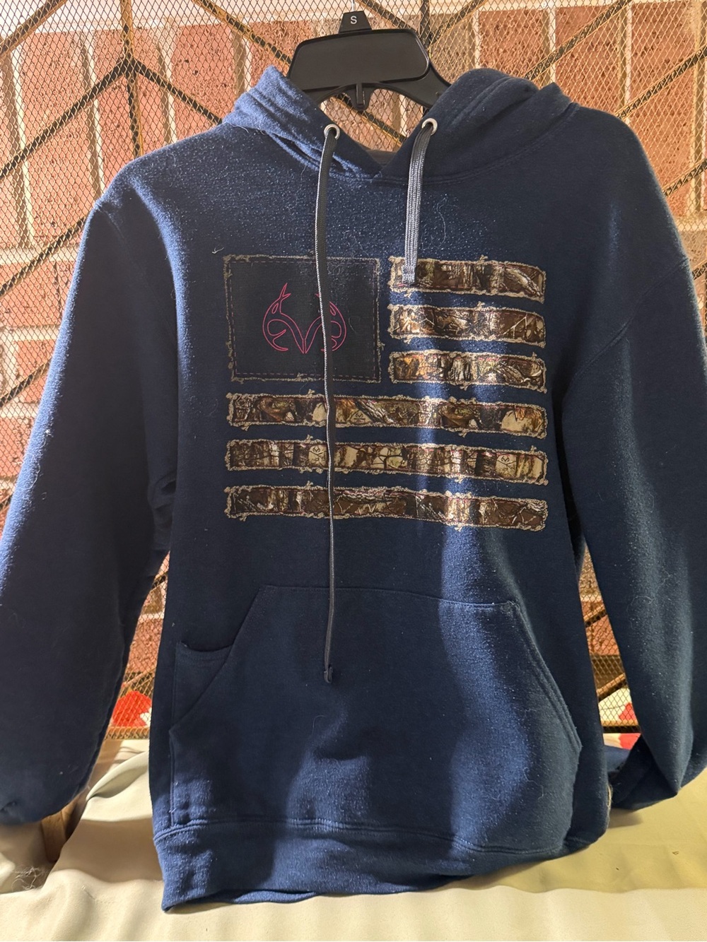 Realtree Women's Navy Pullover Hoodie with Camo Flag Graphic